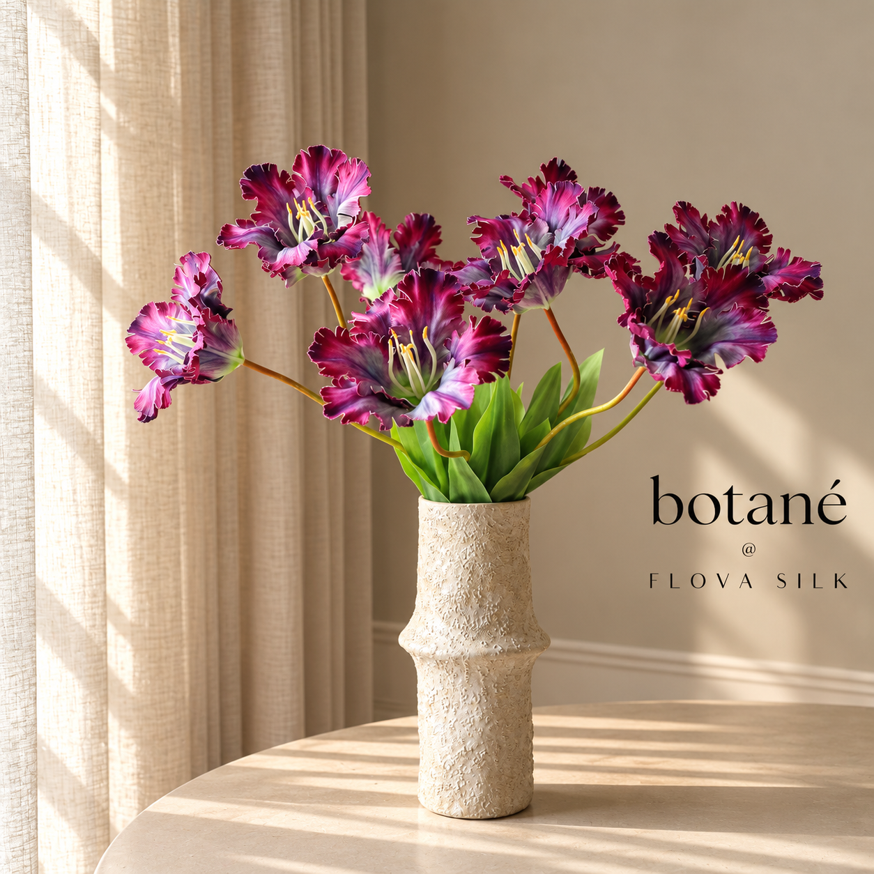 Purple Parrot Tulip Bouquet by Botané featuring five realistic purple artificial tulips in a beige ceramic vase on a round table.