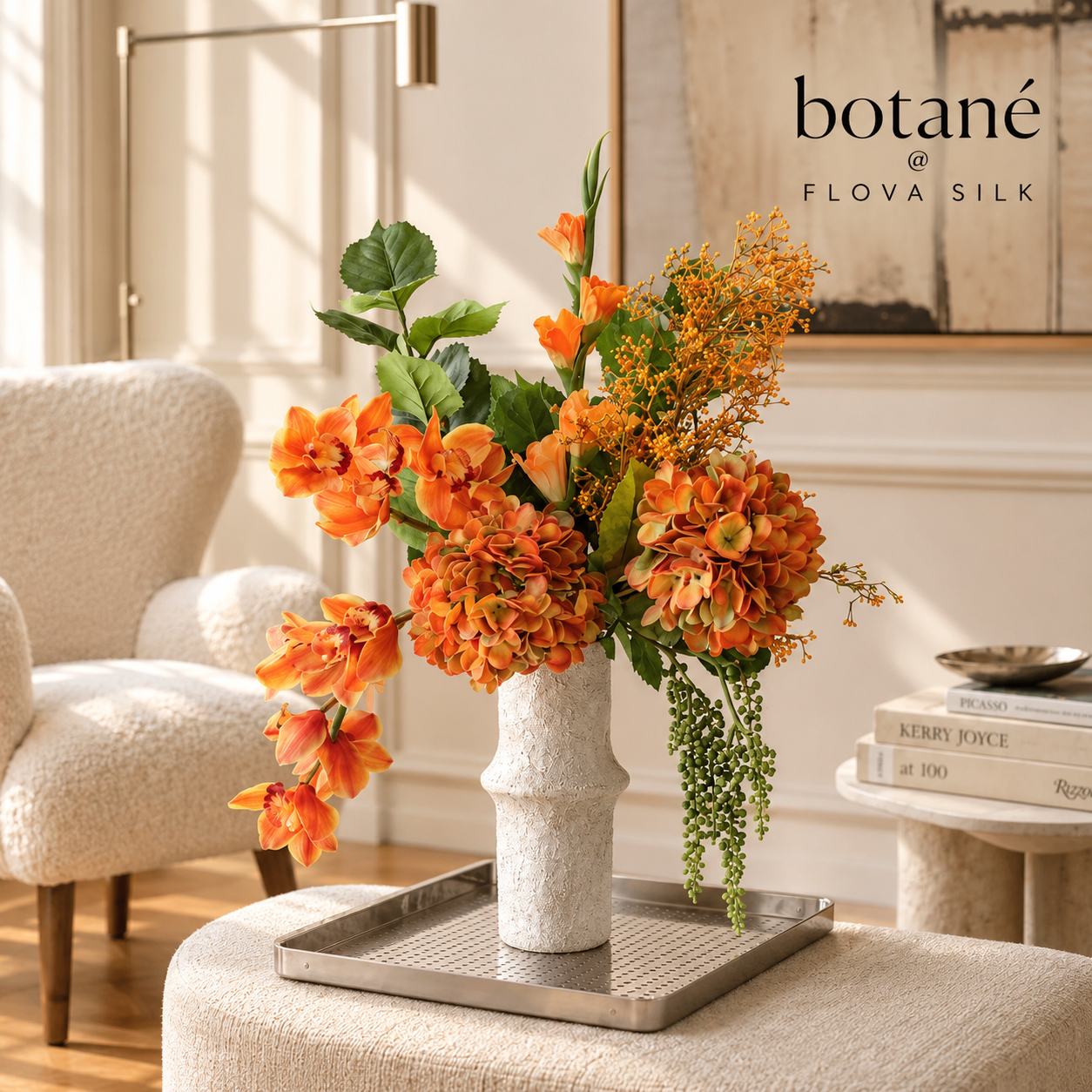 The Orangery luxury artificial flower arrangement by Botané at FLOVA SILK with orange hydrangeas, cascading orchids and gladiolus flowers in a cream ceramic vase.