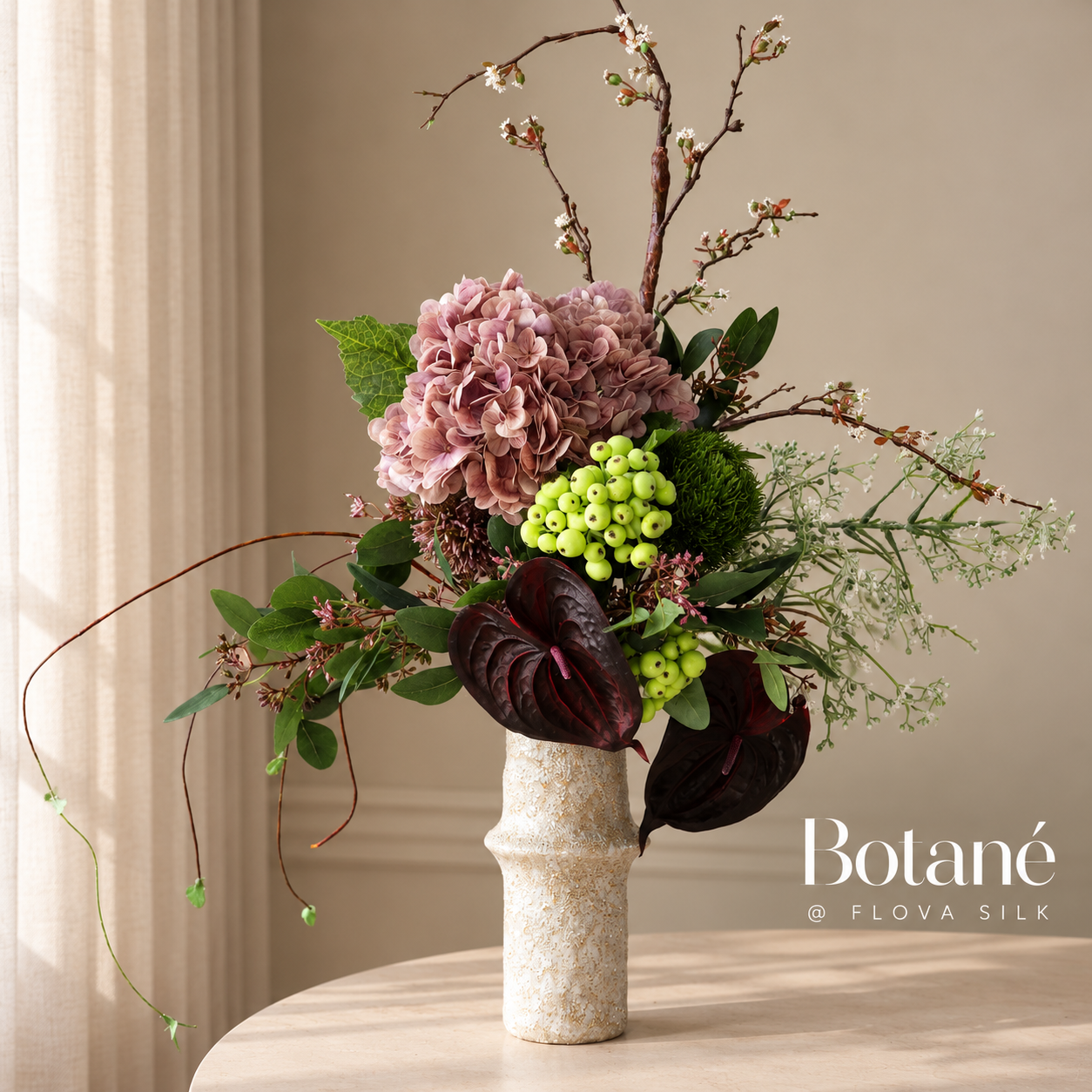 Midnight Vine luxury artificial flower arrangement by Botané at FLOVA SILK with mauve hydrangeas, dark burgundy anthuriums, green berries and decorative branches.